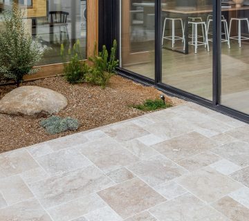 Enhancing Your Building's Aesthetics and Durability: Advantages of Using Travertine Stone for Facades